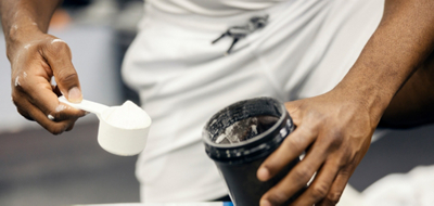 Man filling his shaker bottle