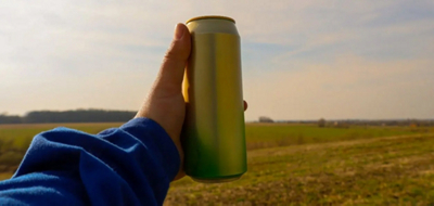 A man holding a energy drink