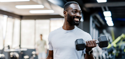 Man using dumbbells 